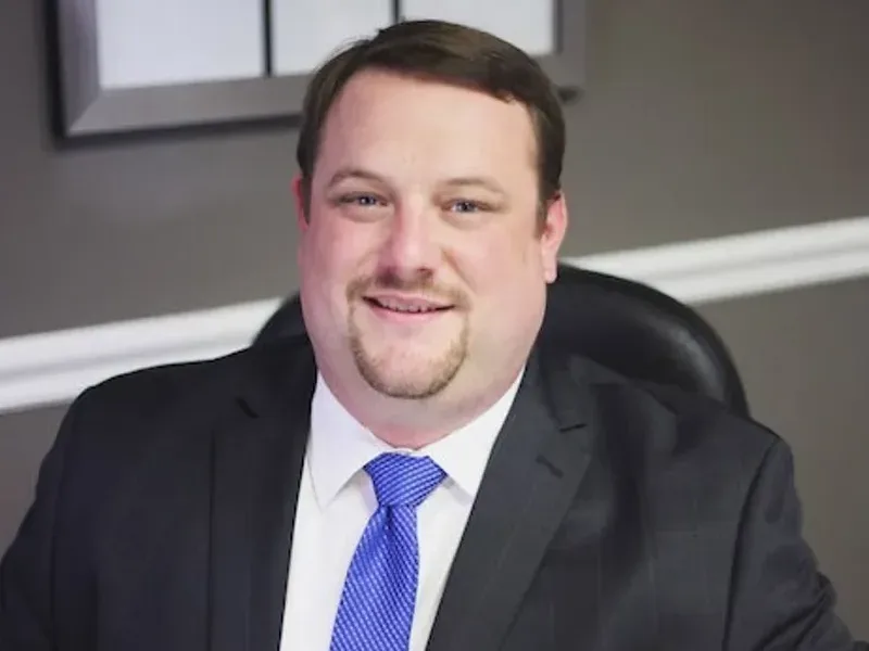 erik noland lawyer baton rouge landscape at desk.webp